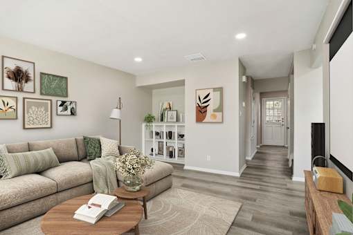 a living room with a couch and a table at The Escapade, San Antonio, Texas