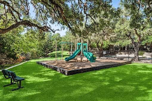 playground with a wooden platform at Crosspoint Oaks at Boerne, Boerne
