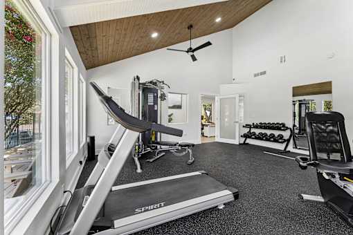 Fitness center with cardio equipment at Knoll Crest Apartments, Texas, 78240