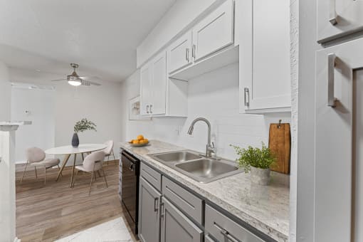 a kitchen and dining area at The Hills at Ironhorse, North Richland Hills, TX, 76180