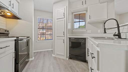 Kitchen area at Polo Clubs Apartments, Austin, TX
