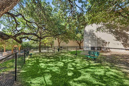 backyard with a green lawn at Crosspoint Oaks at Boerne, Boerne, TX 78006  