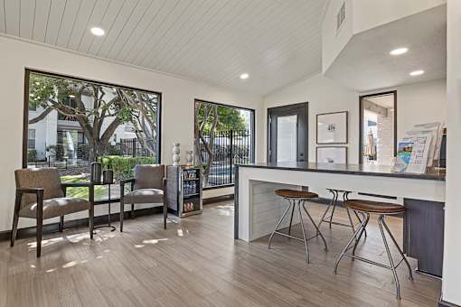 A modern interior with a bar area and seating. at Tradewinds, Windcrest