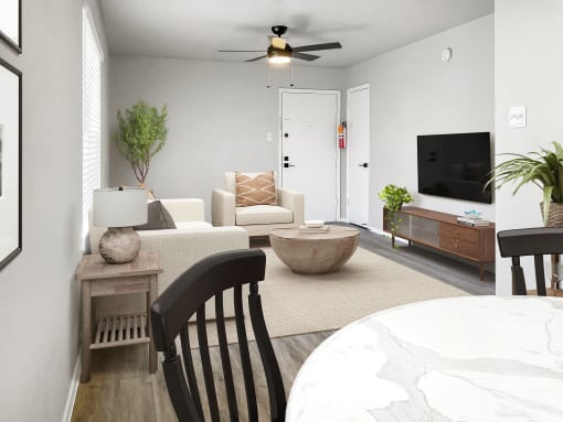 a living room with grey walls and a white door  at Sunset Heights, Texas, 78209