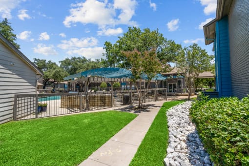 take a dip in the pool at the whispering winds apartments in pearland, tx  at Vesper, Dallas, TX, 75254