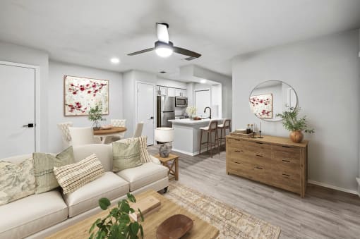 our apartments offer a living room with a couch a coffee table and a dining table  at Carmel at Deerfield, San Antonio