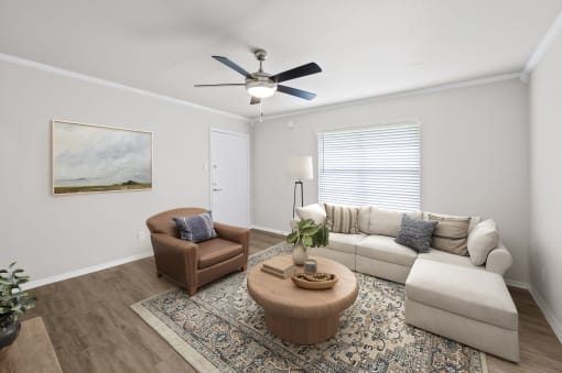 a living room with a ceiling fan and a couch and chair  at Sunset Heights, San Antonio, TX, 78209