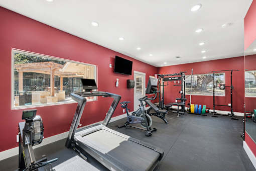 gym with a treadmill  at Crosspoint Oaks at Boerne, Boerne, 78006