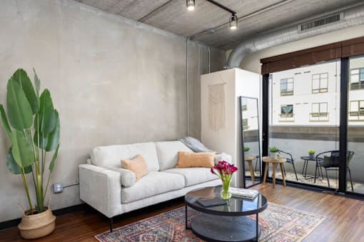 Spacious open-concept layout with soaring ceilings and abundant natural light
