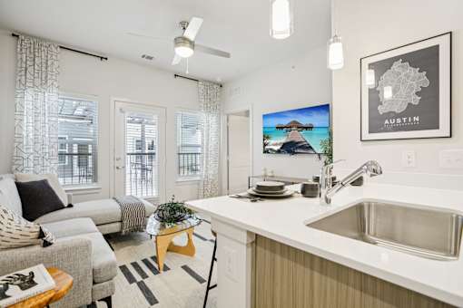 Open concept living room and kitchen at Matador Apartments, Austin, Texas