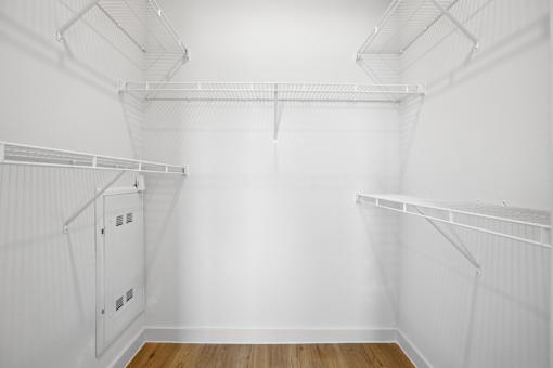 Empty white walk in closet with shelves. at Park South Apartments, Austin, TX, 78748