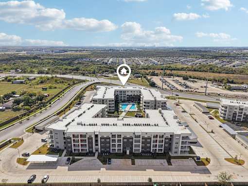 Aerial view of apartment community with pool 1 at Cantarra Apartments, Texas, 78653
