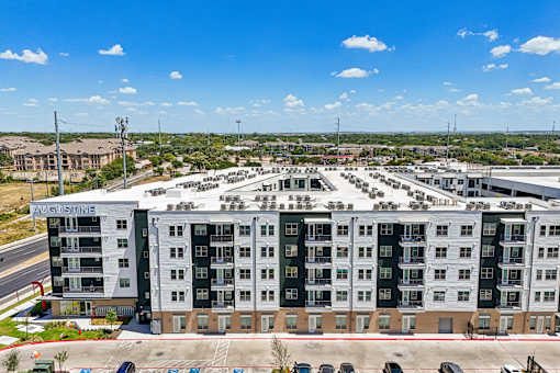 A large, multi-story building with the name "Newbridge" on the side.