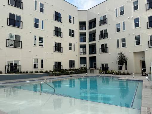 Resort-Style Pool area at ThreeTwenty at the Vybe Apartments, Texas