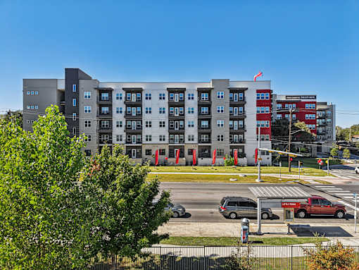 Modern apartment building exterior with street view at Matador Apartments, Austin, TX 78745