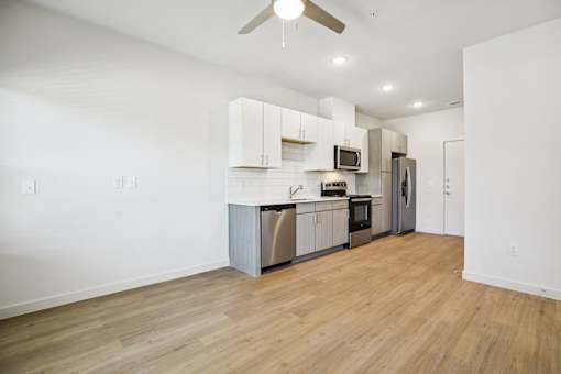 Open concept living space with modern kitchen at Matador Apartments, Austin, 78745