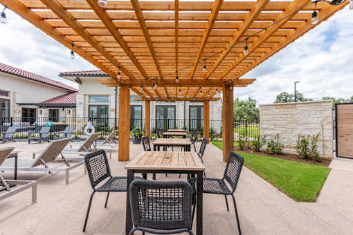 the patio at the bradley braddock road station apartments at Avery Ranch, Texas, 78717