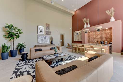 Open concept living and dining area with modern decor at Cantarra Apartments, Manor, 78653
