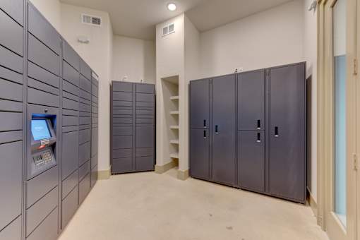 Package locker room with storage cabinets at Cantarra Apartments, Manor, TX