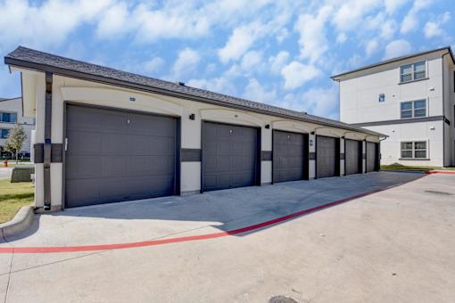 A row of garage doors are closed.