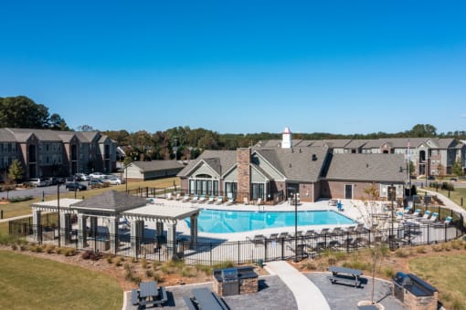 Resort-Style Sundeck at Pool at Emerald Creek Apartments, Greenville, SC, 29607