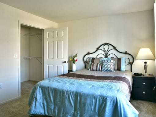 Bedroom with Walk-In Closet at Prairie Lakes Apartments, Peoria, IL, 61615