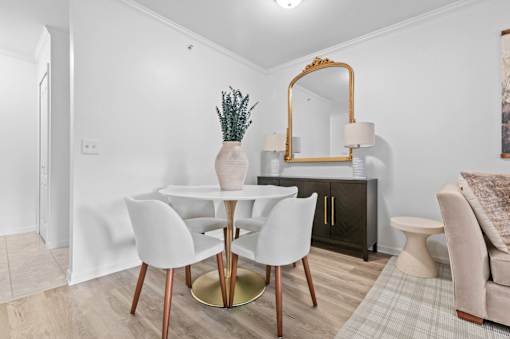 Dining area with modern furnishings at Regents Club of Troy Apartments, Troy, Michigan