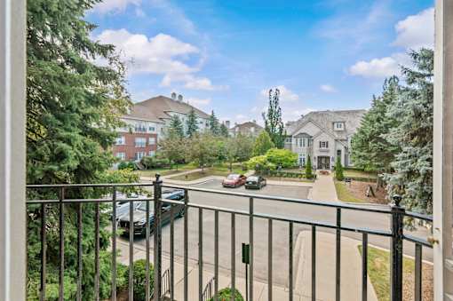 Balcony view of residential neighborhood and street at Regents Club of Troy Apartments, Michigan