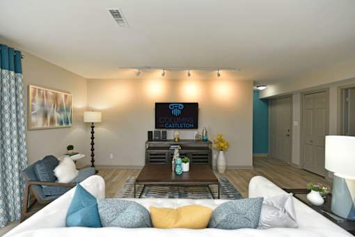 a living room with a couch and a table
