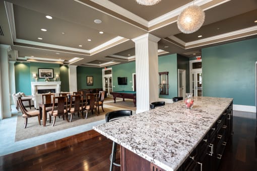 Overview of the kitchen and dinning area at the Club Room at the Residences of Creekside.