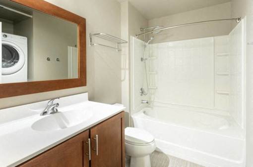 a bathroom with a sink toilet and a shower at Ann Arbor City Club, Ann Arbor, 48104