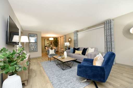 a living room with a couch and a table