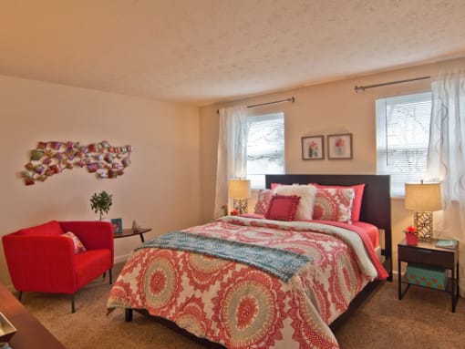 Large bedroom at Galloway Village with bed and furniture