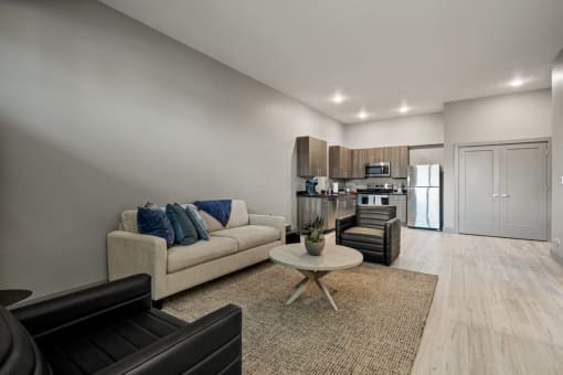a living room with a couch and a table