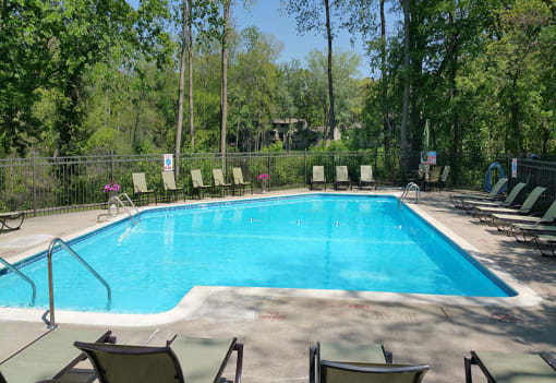 Outdoor pool with patio furniture