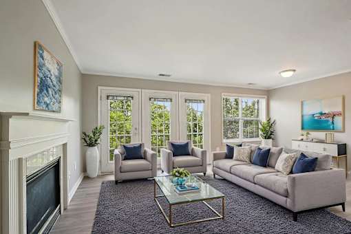 A living room with a fireplace and a couch.