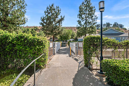 Walking bridge from apartment complex to tennis court