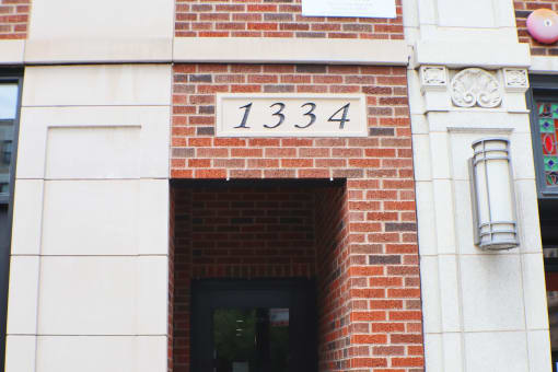 a brick building with the number 1334 on it