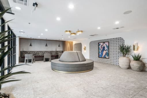 clubroom with a seating area and a round couch at Vera Cortez Hill, San Diego, CA, 92101