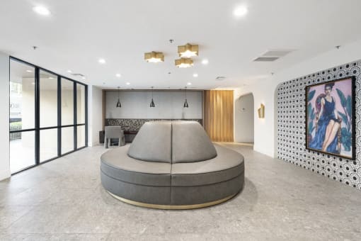 clubroom with a circular couch at Vera Cortez Hill, San Diego, CA, 92101