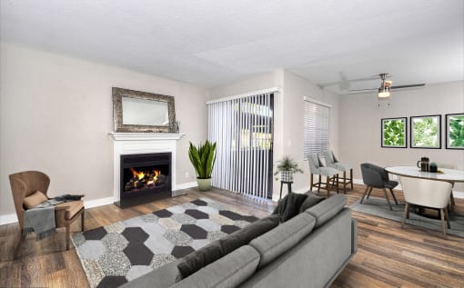 Living area with fireplace and sliding glass doors to balcony at Pointe Niguel, Laguna Niguel, CA