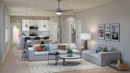 Townhomes In Taylor, TX For Rent - Mihir Taylor - Open-Concept Living Room With Ceiling Fans, Modern Light Fixtures, Luxury Vinyl Plank Flooring, And Access To Kitchen Area.
