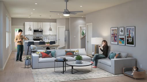 Townhomes In Taylor, TX For Rent - Mihir Taylor - Open-Concept Living Room With Ceiling Fans, Modern Light Fixtures, Luxury Vinyl Plank Flooring, And Access To Kitchen Area.
