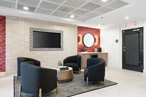 clubroom with seating and tv at Vera Cortez Hill, San Diego, California