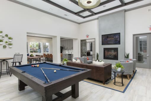 Clubroom with seating area at The Grove Apartments, Ontario