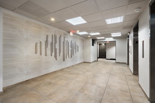 Hallway with elevators at Vera Cortez Hill, San Diego, CA, 92101