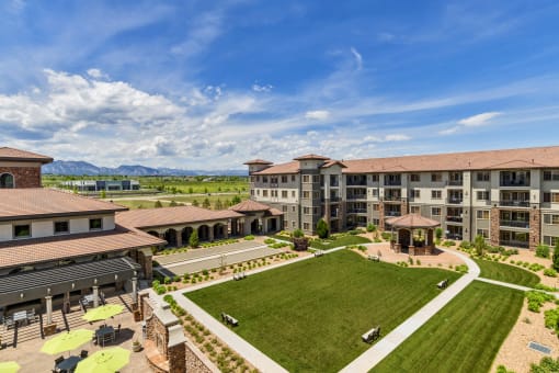 Pet-Friendly Apartments in Broomfield, CO - Terracina - Courtyard with Manicured Lawn, Benches, and Gazeebo