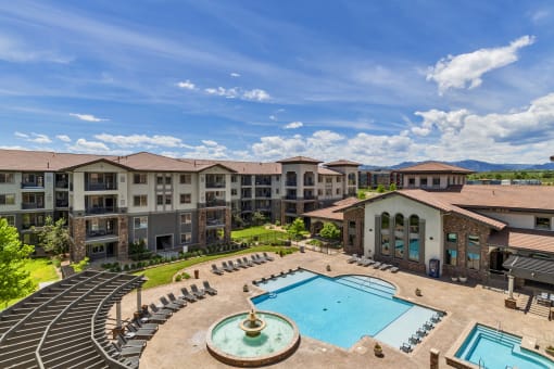 Bird's Eye View of Pool, Jacuzzi, and Surrounding Lounge Seating at Terracina, Colorado 80020