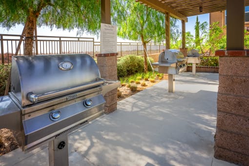 Covered outdoor area with bbq grills