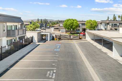 A parking lot with a sign that says "Future Residential Parking Only".